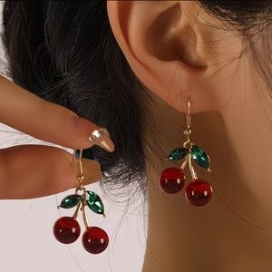 Gold Cherry Drop Earrings with Red Stones and Green Leaves